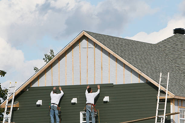 Professional Siding Repair technician working in Woodmere, NY